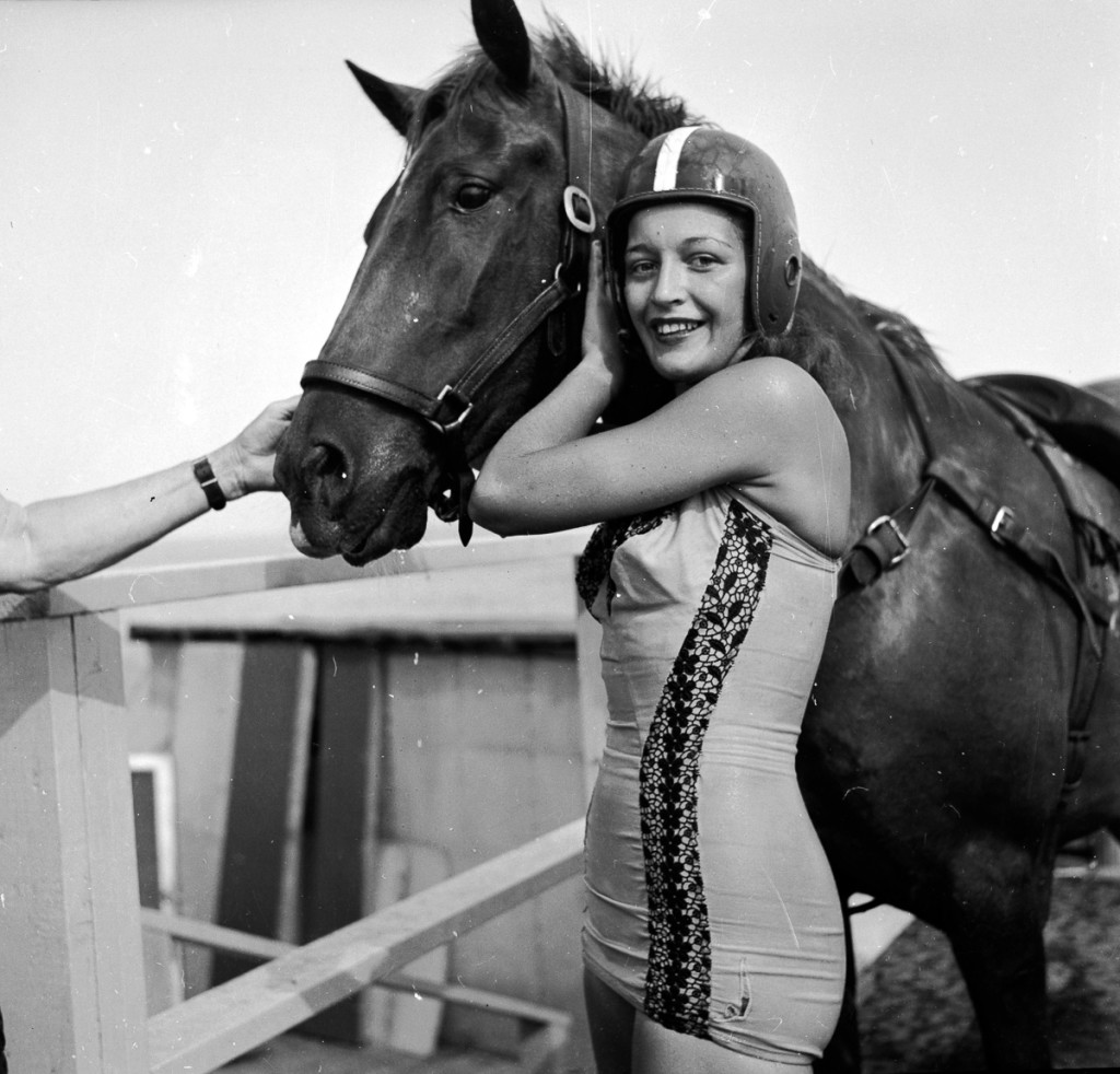 circa 1955:  Dinah, a diving horse stands with her rider just after a dive.  (Photo by Three Lions/Getty Images)