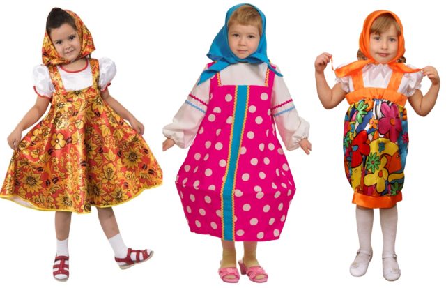 три девочки в костюмах матрешек